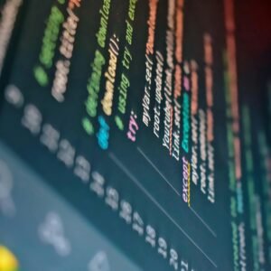 Vibrant close-up of a computer screen displaying color-coded programming code.